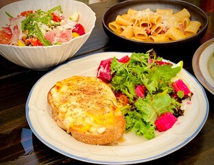 Cheese Toast with Salad and Pasta, Gourmet Brunch Spread in Cafe Setting