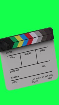 A film clapperboard with colorful stripes transition on chroma key green screen background. Change from screen to new screen vertical video