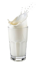 A clear glass filled with white milk with a splash and droplets of milk erupting from the top isolated on transparent background
