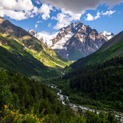 Obraz premium A scenic valley unfolds, with snow-capped peaks and a flowing river