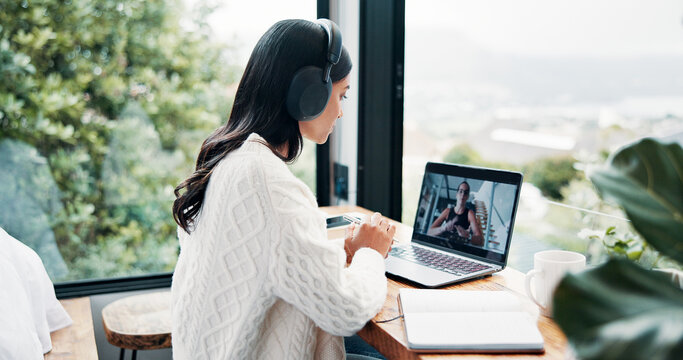 Headphones, laptop screen or video call and woman in home with view for remote work communication. Computer, virtual meeting and window with freelance employee in apartment for small business contact