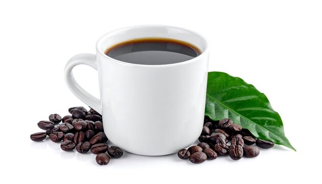 A white mug filled with hot black coffee, surrounded by roasted coffee beans and a fresh green coffee leaf, isolated on a white background.