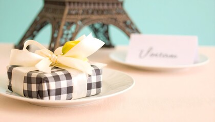 Naklejka premium Gifted Present on Plate with Eiffel Tower and Name Card in Soft Light
