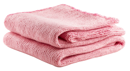 Soft pink knitted blanket folded neatly on a plain white background