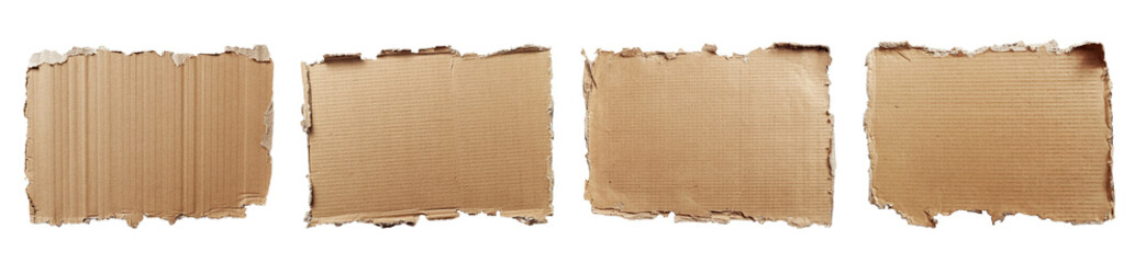 torn brown corrugated cardboard pieces on background.