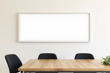 Empty white blank long horizontal rectangle frame, mockup artwork or picture frames, hanging on clean plain wall above three black chairs and wooden table in meeting room.