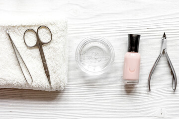 Naklejka premium French manicure - preparing tools on wooden backround top view