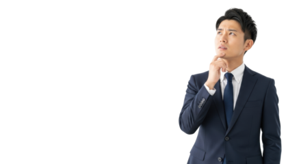 Young japanese man in navy suit, hand to chin, thoughtful, subtle confusion, gazing upwards, perfectly lit against white studio background with copy space concept of problem-solving