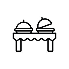 Two buffet servers one with the lid open set on a table