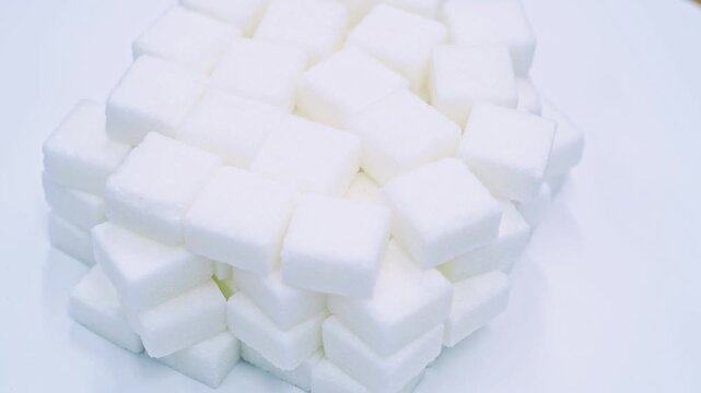High angle view rotation of sugar lumpy close-up