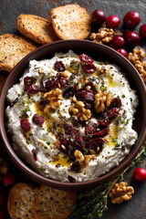 Whipped feta dip with cranberries, walnuts and herbs, festive appetizer