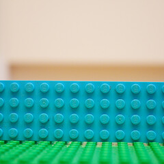 Fototapeta premium Close-up of colorful Lego bricks, perfect for creative building and play