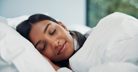 Blanket, relax and sleeping with woman in bed of hotel for comfort, peaceful nap or resting....