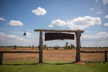 Helicopter arrives Wild Australia remote wilderness landscape