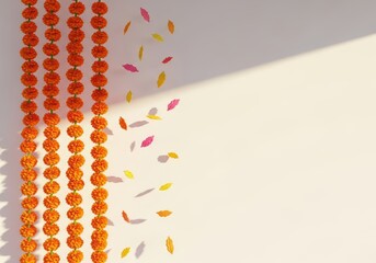 Orange Marigold Garland Decoration with Falling Petals and Sunlight Shadows