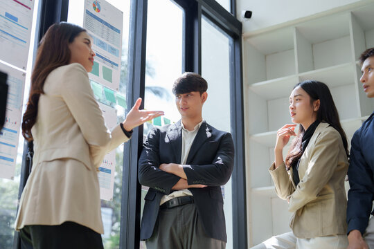 Business team discussing data during office meeting