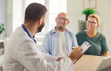 Doctor discusses treatment and care plans, reviews records and schedules followup with g senior...