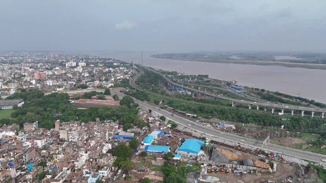Evening view of Patna Marine Drive with JP Ganga Setu stretching across the Ganges in Bihar, India. A blend of modern infrastructure and riverside beauty, capturing city life, skyline, and tranquil wa