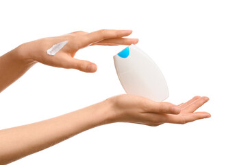 Female hands with bottle of cosmetic cream on white background