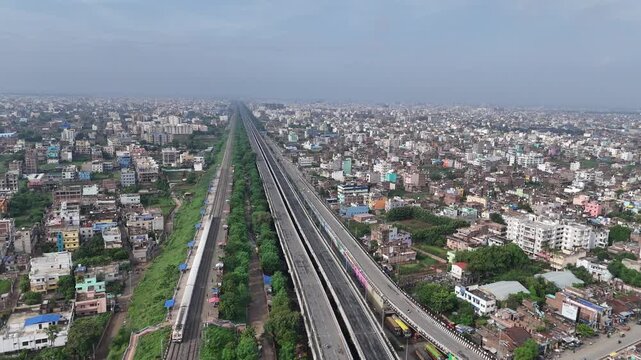 Evening view of Patna Marine Drive with JP Ganga Setu stretching across the Ganges in Bihar, India. A blend of modern infrastructure and riverside beauty, capturing city life, skyline, and tranquil wa