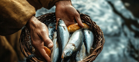 jesus' hands holding a basket with fish and bread, 