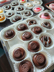 Colorful Donuts, Berliner, Krapfen with sugar icing and chocolate.