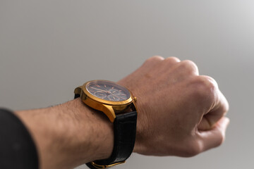 Men's Wrist Watches, a watch on a man's hand