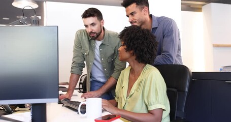 Diverse team working together on computer - Powered by Adobe
