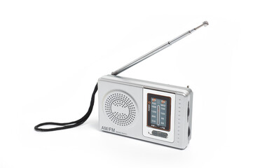Portable battery-powered AM/FM radio photographed against a white background.
