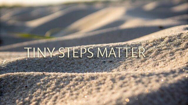 Detailed Close-up of Sand Waves with Inspirational Text about Small Actions Making a Difference in Nature