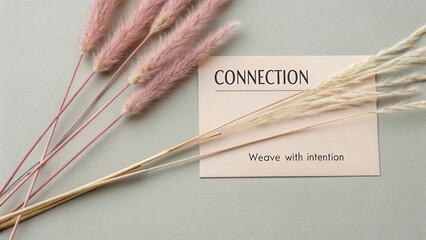 Elegant composition of dried flowers and a card promoting connection and intention for wellness and mindfulness themes