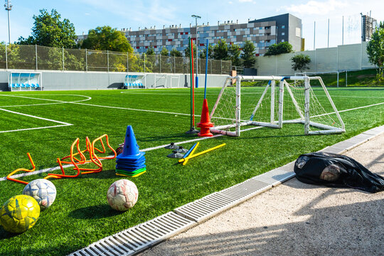 Soccer training field with various sports equipment