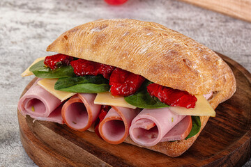 Ciabatta with mortadella, tomato, cheese and spinach