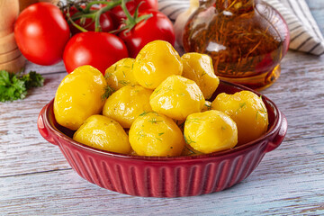 Boiled young potato with oil