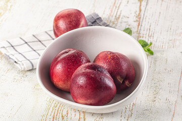 Ripe sweet juicy nectarines heap