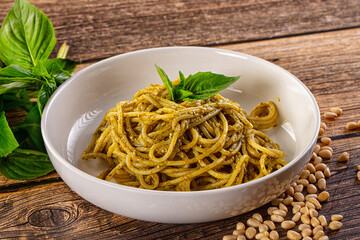 Italian green pasta with pesto sauce
