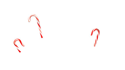 Obraz premium Three candy canes with red and white stripes on a stark black background creating a festive holiday scene