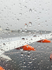 FLIGHT UNDER THE RAIN