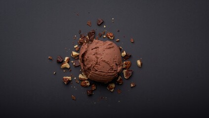 Chocolate Dream, Nutty Delight. A Dessert Still Life on a Dark Textured Surface.