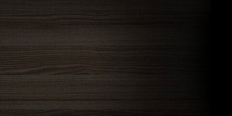 Horizontal close-up smooth dark wood featuring rich. Strong, soft vignette that fades edges into...