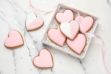 Gift box with sweet heart-shaped cookies on white background. Valentine's Day celebration