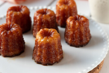 Local French dessert canele served on a plate
