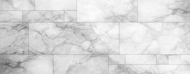Light gray and white marble tile wall with natural vein patterns arranged in rectangular pieces creating a smooth textured surface
