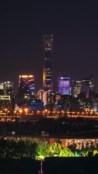 Night view of Beijing, China, featuring China Zun Tower, the CCTV Headquarters, and the CBD building clusters