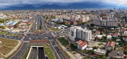 Aerial panoramic view of Tirana, Albania, showing Dritan Hoxha Road intersection with the outer...
