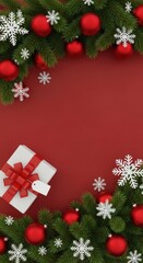 Christmas background with fir branches, red baubles, snowflakes and gift box.