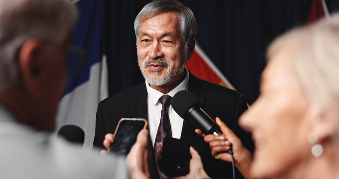 Politician, man or media interview at press conference for policy feedback, follow up question or opinion. Mic, minister and speaking to journalists with phone for public briefing and news coverage