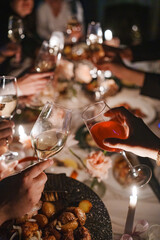 Celebration with toasting glasses at a festive dinner