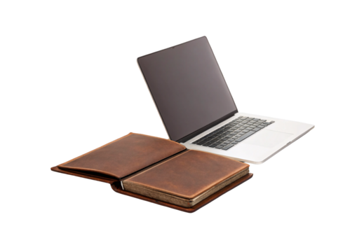 Closed brown leather notebook next to open silver laptop computer, isolated on a transparent background - Powered by Adobe