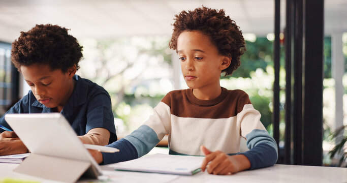 Tablet, homework and children in house with education, learning or studying for test together. Writing, book and boy kids with knowledge for school assignment, assessment or exam by desk in apartment